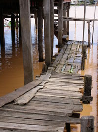 Wooden jetty on pier at lake