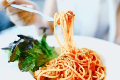 Close-up of pasta in plate on table