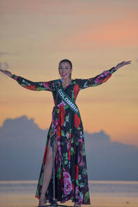 Portrait of woman standing against sky during sunset