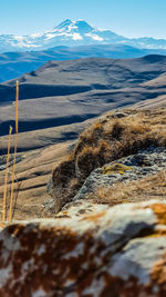 Scenic view of snowcapped mountains against sky