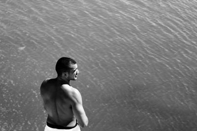 Reflection of woman in water