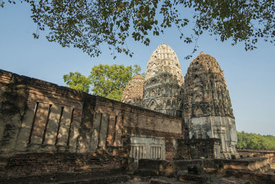 Old temple building against sky