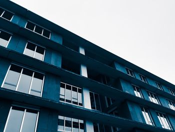 Low angle view of modern building against clear sky