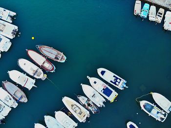 High angle view of boats moored at harbor