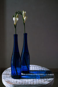 Close-up of glass vase on table