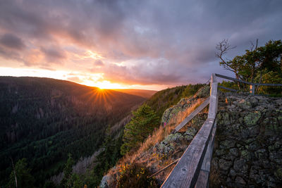 Scenic view of landscape against sky during sunset