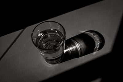 High angle view of drinking glass on table