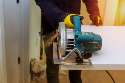 Man working on metal structure