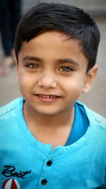 Close-up portrait of cute smiling boy