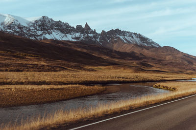 Scenic view of snowcapped mountains against sky