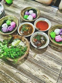 High angle view of various flowers on table