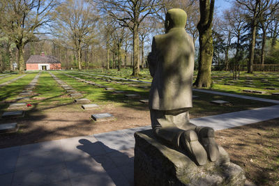 Rear view of statue in park