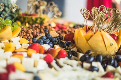 Close-up of fruits arranged in plate