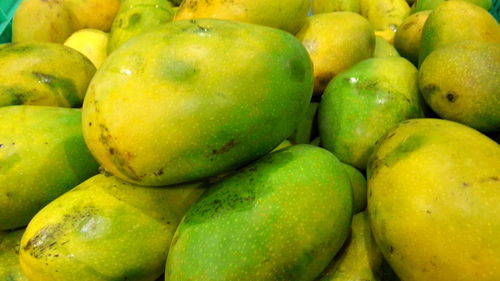 Full frame shot of lemons in market