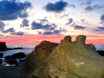 Scenic view of sea at sunset