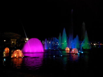 View of illuminated city at night