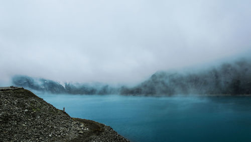 Scenic view of sea during foggy weather