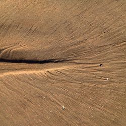 Footprints on sandy beach