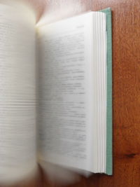 High angle view of open book on table