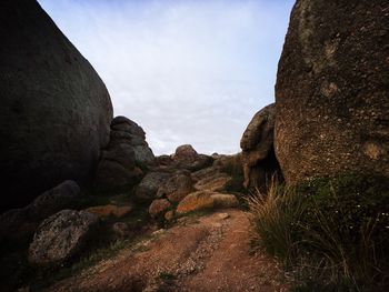 Rocks on rocks against sky