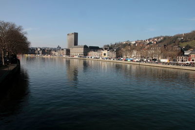 View of buildings in city against clear sky
