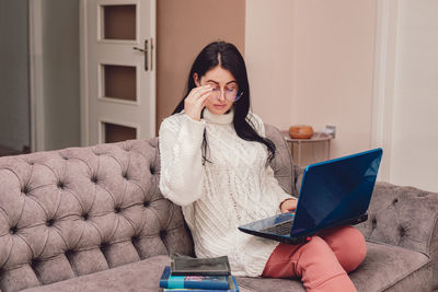 Woman freelancer working remotely in comfort her home