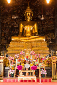 Low angle view of buddha statue in ancient temple