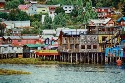 Houses by river