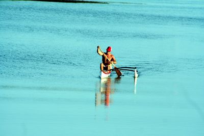 Reflection of people in water