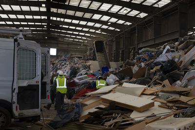 People working in abandoned factory