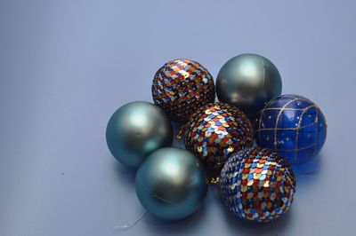 Close-up of christmas decorations on white background