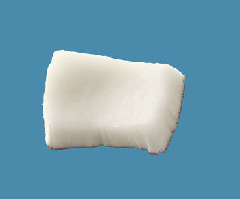 Close-up of bread against blue background