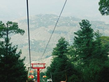 Low angle view of overhead cable car