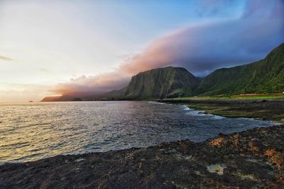 Scenic view of sea against sky at sunset