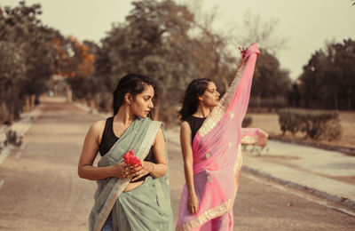 Young woman standing outdoors