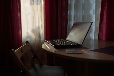 Close-up of laptop on table