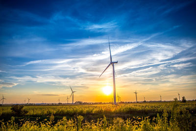 Scenic view of landscape against sky during sunset