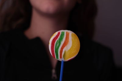 Midsection of woman holding ice cream