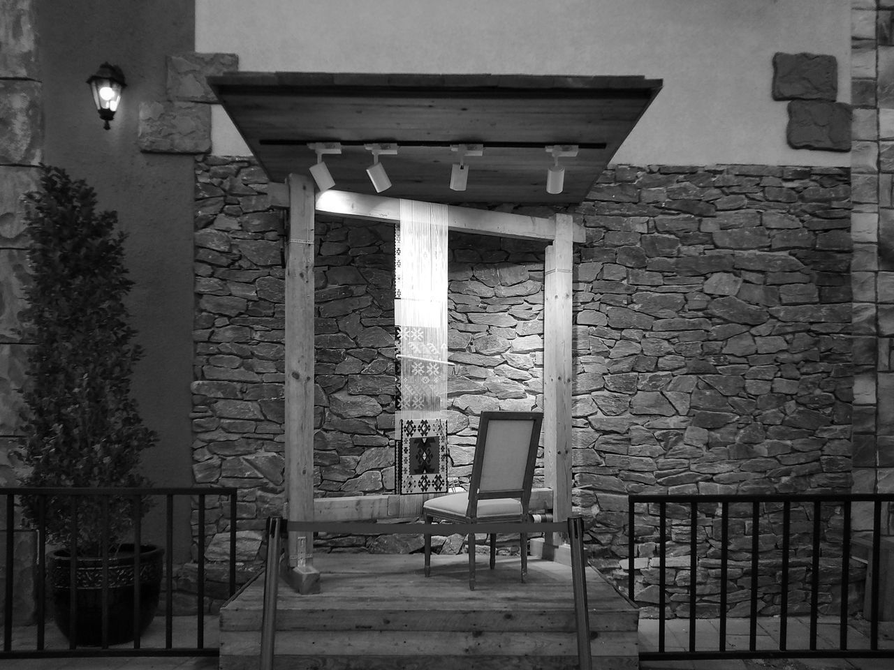 EMPTY CHAIRS AND TABLES IN BUILDING