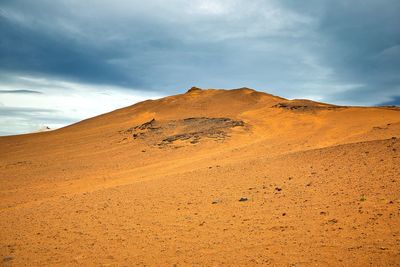 Scenic view of desert against sky
