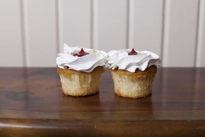 Close-up of cupcakes on table