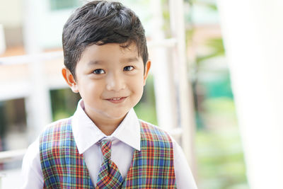 Portrait of cute boy smiling