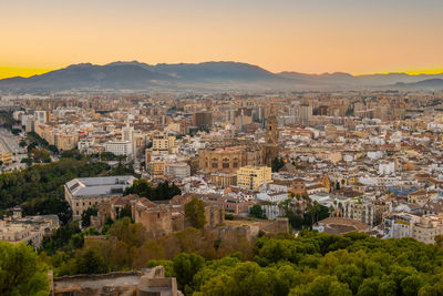 High angle view of townscape against sky during sunset