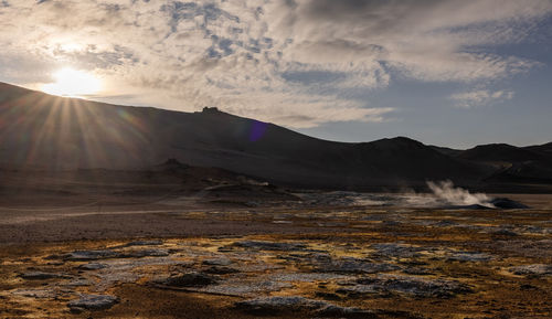 Scenic view of mountains against sky during sunset