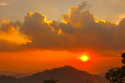 Scenic view of dramatic sky during sunset