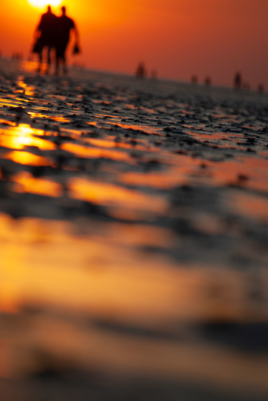 SCENIC VIEW OF SEA AGAINST ORANGE SKY