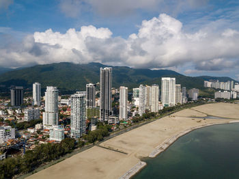 High angle view of buildings against sky in city