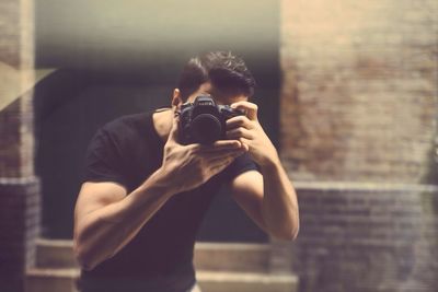Close-up of woman standing on bench