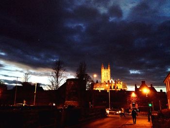 City street against cloudy sky