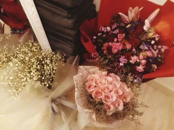 Close-up of hand holding bouquet